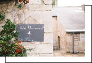 Photo of Hotel and Restaurant Sign
